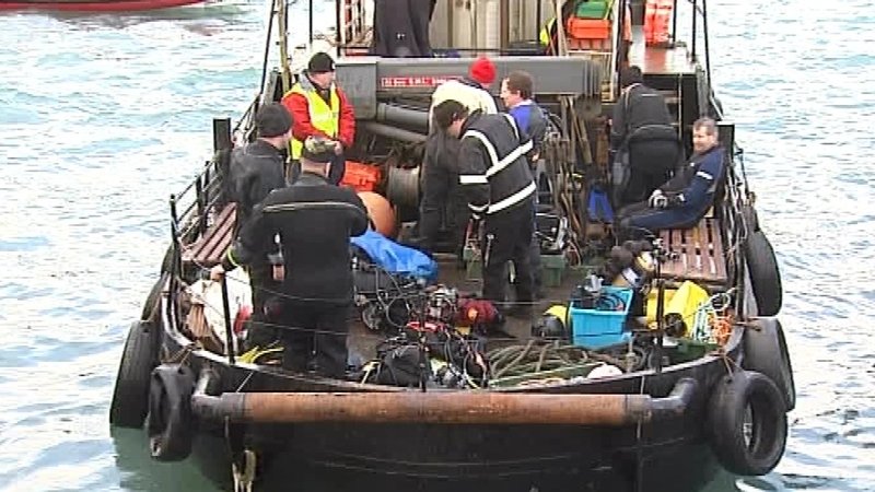 The search for three missing fishermen will resume in the morning