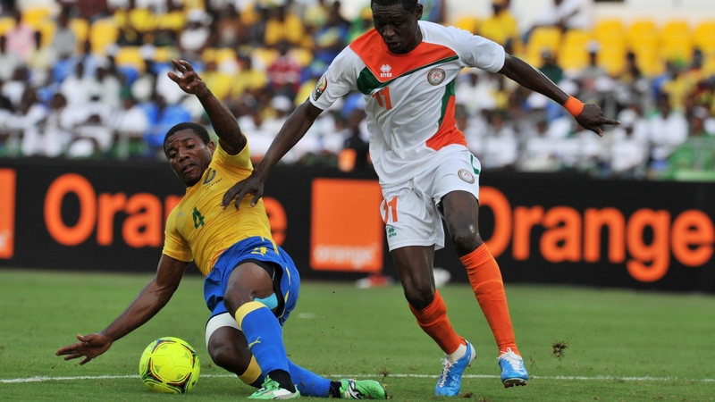 Gabon's Remy Ebanega dispossesses Niger's Issoufou Alhassane in Libreville