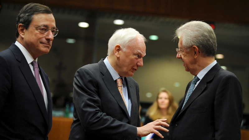 ECB chief Mario Draghi, European Bank of Investment president Philippe Maystadt and Italian Prime Minister Mario Monti speak at the Ecofin meeting in Brussels