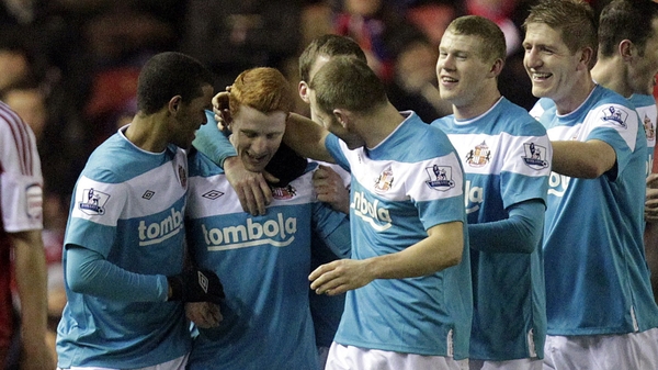 Jack Colback is mobbed by his Sunderland team mates after his opener