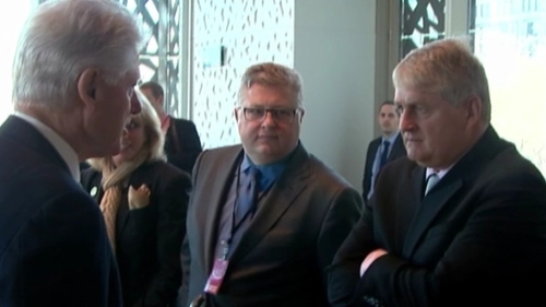 Bill Clinton greets businessman Denis O'Brien