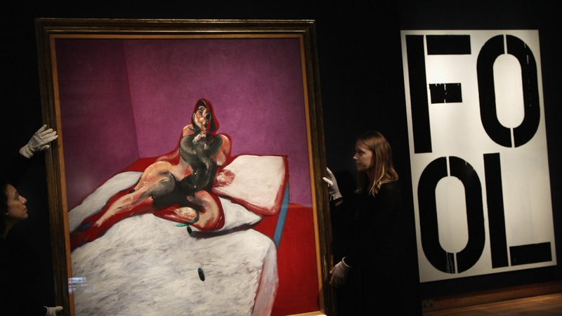 Christie's auction house employees hang a 'Portrait of Henrietta Moraes' by Francis Bacon