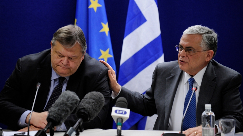 Greek Prime Minister Lucas Papademos (right) said he was "very happy" with the deal
