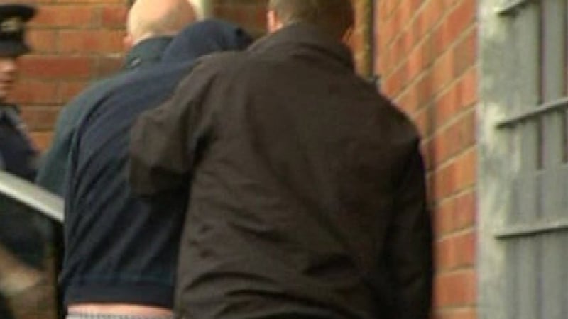 Keith Hall (left in blue hooded jacket) appeared before Tallaght District Court