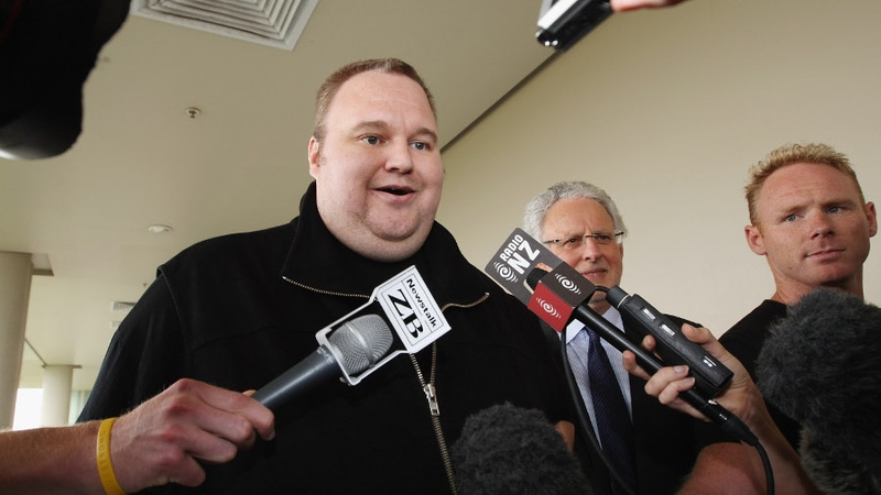 Kim Dotcom told reporters he was "really happy to be out"