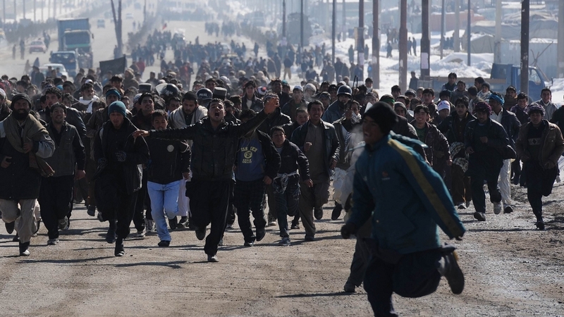 At least 12 protesters and two American soldiers have been killed during protests sparked by the incident