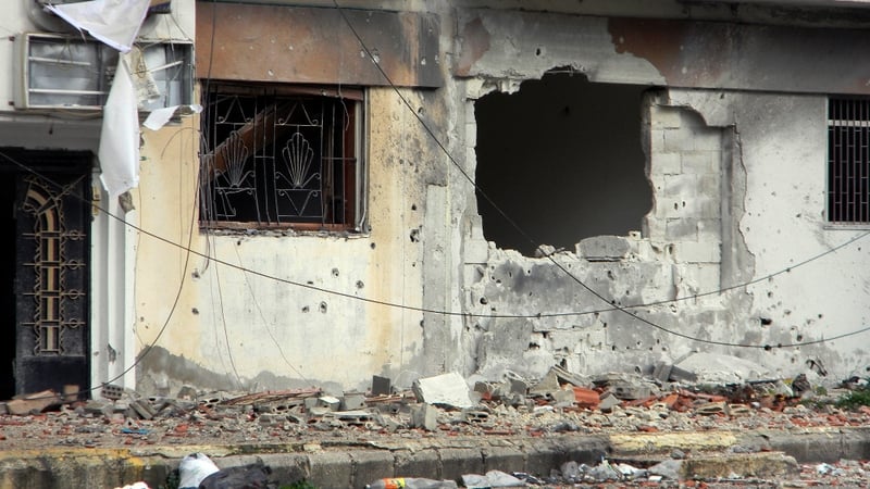 The Syrian Red Crescent has evacuated a small number of people from Homs