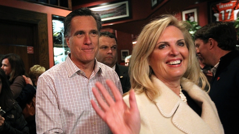 Mitt Romney and his wife Ann celebrate Washington win