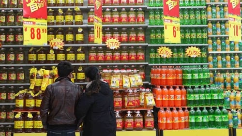 China's industrial output grew at a slower pace than expected but retail sales performed better