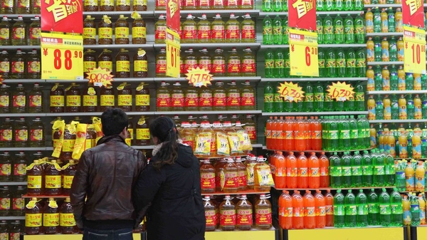 China's industrial output grew at a slower pace than expected but retail sales performed better