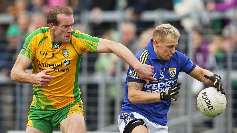 Donegal's Barry John Keane is tackled by Neil Gallagher of Kerry
