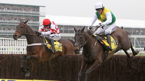 Riverside Theatre ridden by Barry Geraghty (left) on the way to beating Albertas Run ridden by Tony McCoy (right) to win the Ryanair Chase