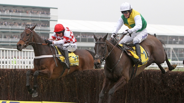 Riverside Theatre ridden by Barry Geraghty (left) on the way to beating Albertas Run ridden by Tony McCoy (right) to win the Ryanair Chase
