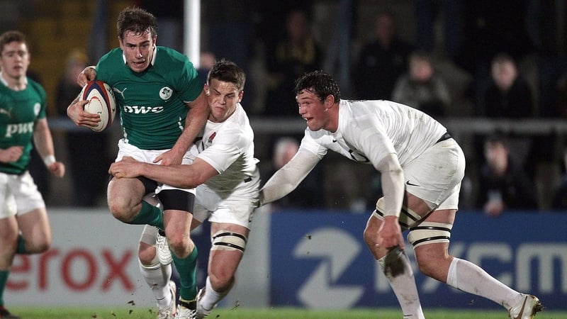 Ireland's JJ Hanrahan is tackled by England's Will Addison