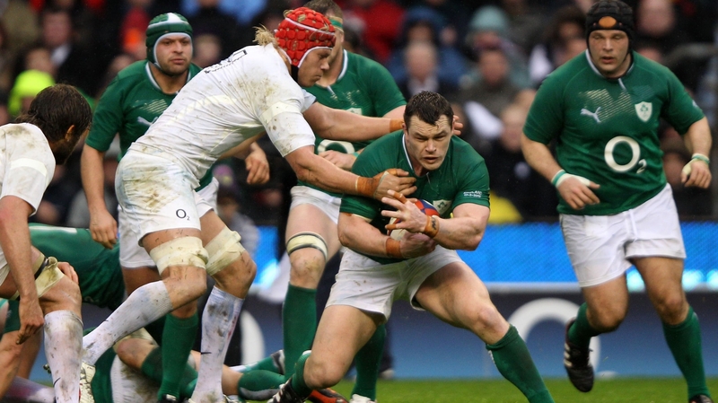 Mouritz Botha of England tackles Cian Healy of Ireland