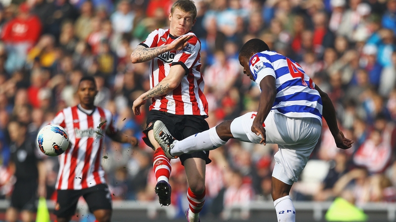 Republic of Ireland and Sunderland winger James McClean challenges Nedum Onuoha of QPR