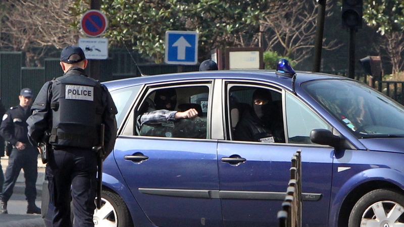 A police vehicles carrying Abdelkader Merah, arrives at police headquarters in Paris