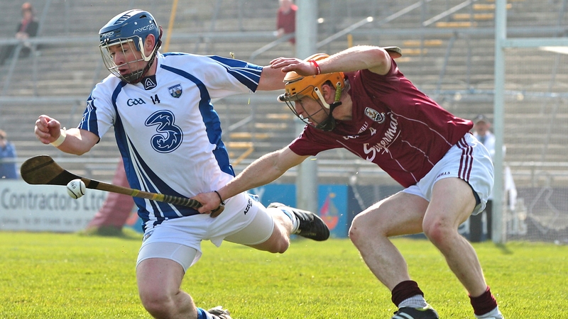 Galway's Ger O'Halloran with Shane Walsh of Waterford