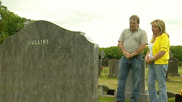 Steve and Carmel Collins pictured at their son Roy's grave