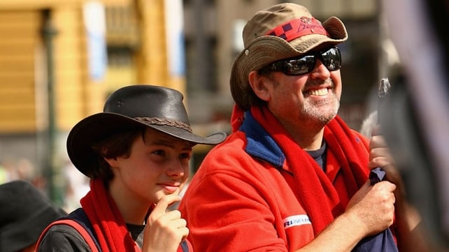 These two Melbourne Demons supporters came to pay their respects