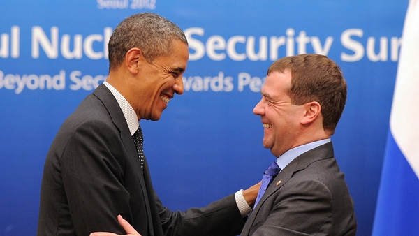 US President Barack Obama and Russian President Dmitry Medvedev share a smile after their bilateral meeting in Seoul
