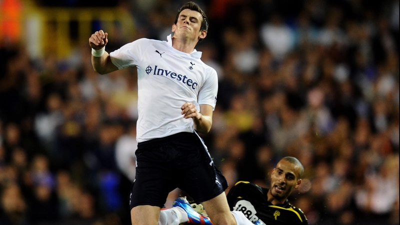 Gareth Bale goes down following a challenge from Darren Pratley