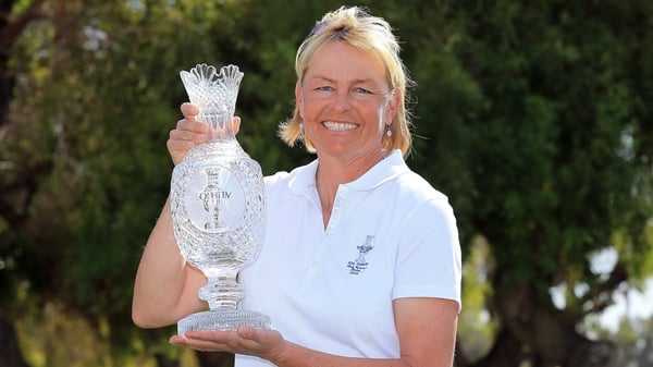 Liselotte Neumann shows off the Solheim Cup won in Meath