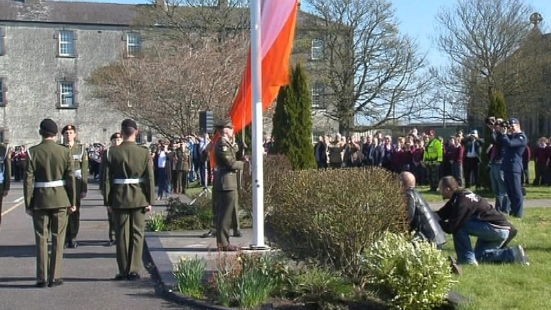 The tricolour is lowered for the last time at Columb Barracks when it closed a decade ago (file image)