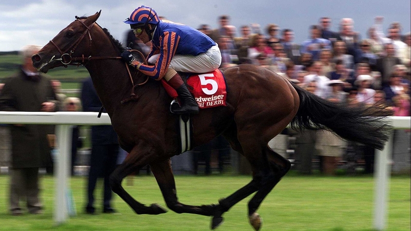 Montjeu, ridden by Mick Kinane, wins the Irish Derby in 2000