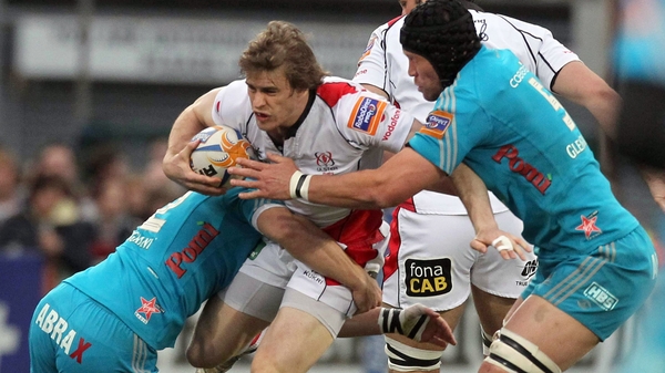 Andrew Trimble is tackled by Aironi's Matteo Pratichetti and Carlo Del Fava