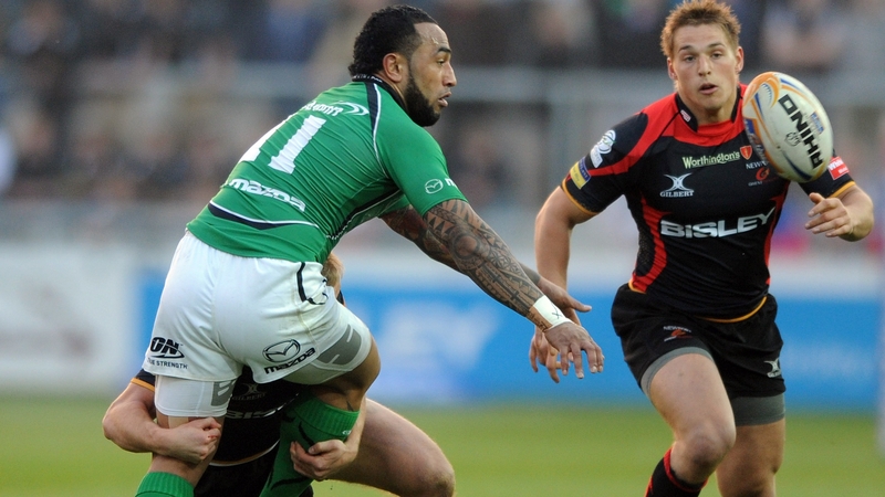 Fetu'u Vainikolo of Connacht is tackled by Ashley Smith of Dragons