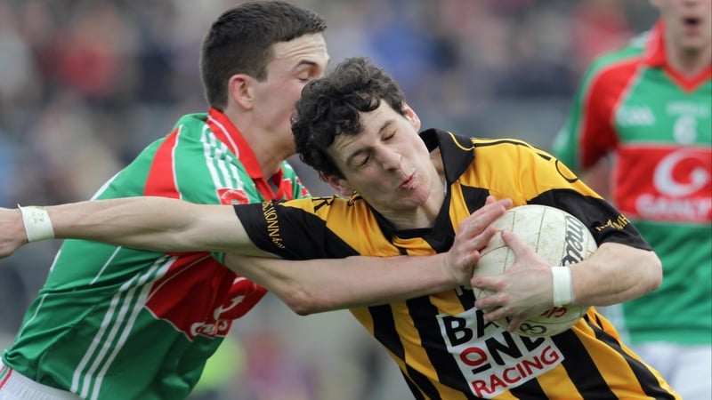 Garrycastle's Mark McCallon with Jamie Clarke of Crossmaglen
