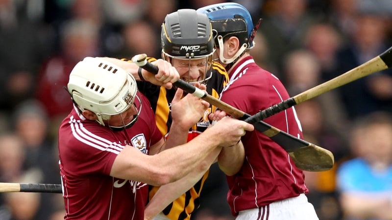 Galway's David Burke and Brian Flaherty with Michael Rice of Kilkenny