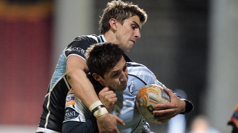 Cardiff Blues' Gavin Henson is tackled by Peter Murchie during Glasgow's 31-3 win over the Welsh side