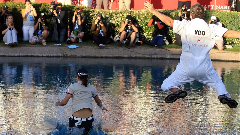 Sun Young Yoo and caddie Adam Woodward cool off in the Poppy's Pond after Yoo's dramatic major victory