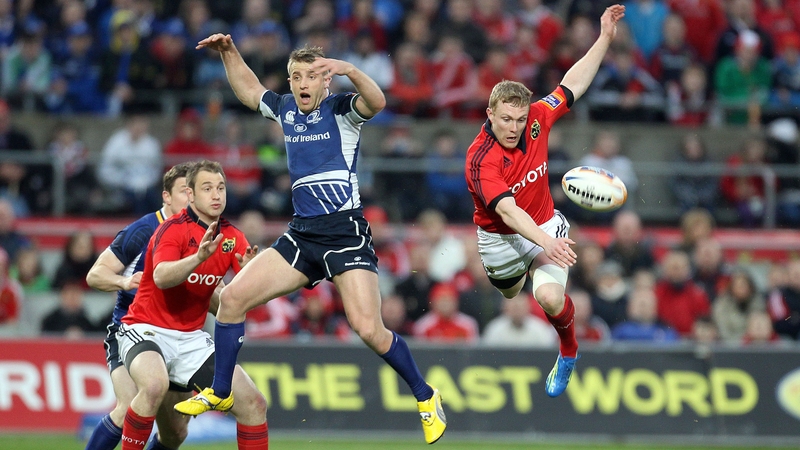 Luke Fitzgerald and Keith Earls compete for a ball during a Munster v Leinster derby clash - this season's meeting is live on RTÉ Two, RTÉ Two HD and Online on 5 October