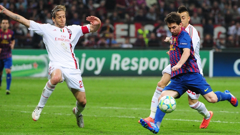 Massimo Ambrosini blocks Lionel Messi's shot during last week's 0-0 draw at the San Siro