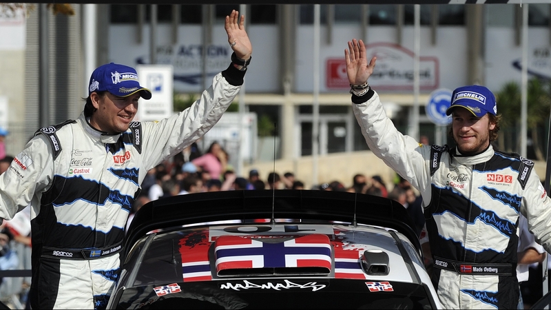 Mads Osteberg (R) and his Swedish co-driver Jonas Anderson