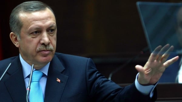 Turkish Prime Minister Recep Tayyip Erdogan has said Turkey might set up a buffer zone