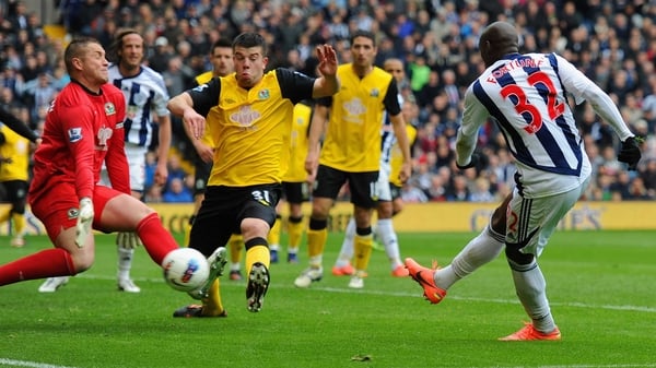 Marc-Antoine Fortune of West Brom scores to make it 2-0