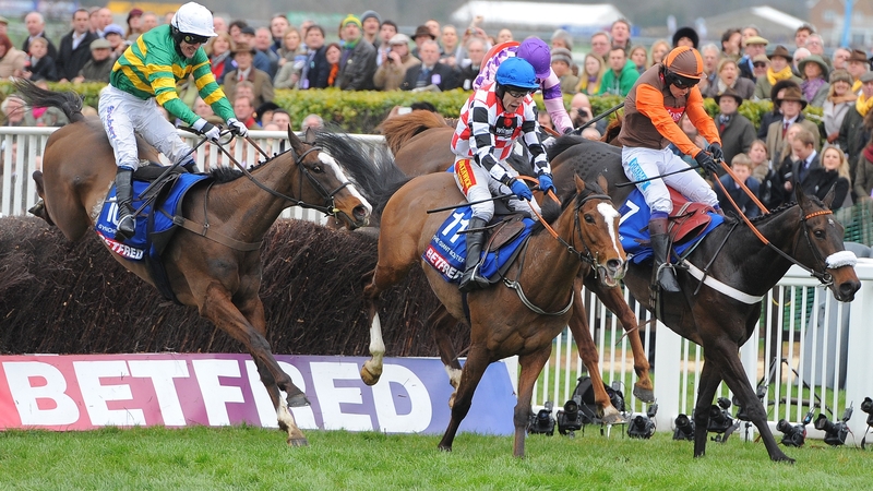 Tony McCoy and Synchronised clear the last in the Gold Cup