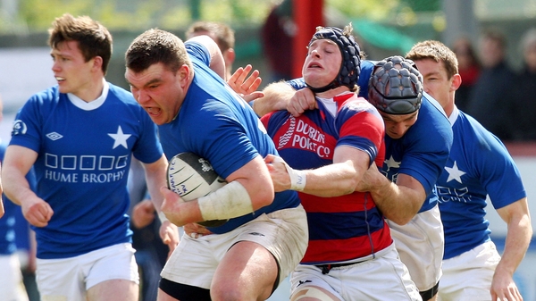 Robert Sweeney of St Mary's and Barry O'Mahony of Clontarf during the match