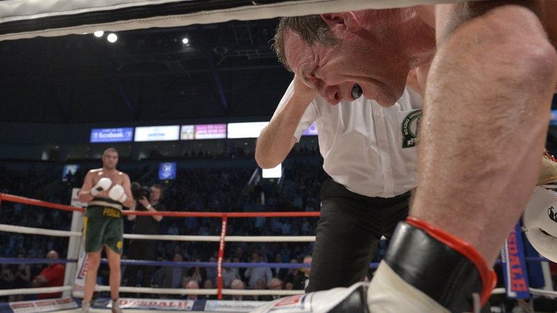 Martin Rogan on the ground after a hard left to the body