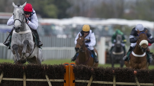 Super Duty (r) ran a huge race to finish second behind Simonsig (red cap) at Aintree. He'll now go chasing