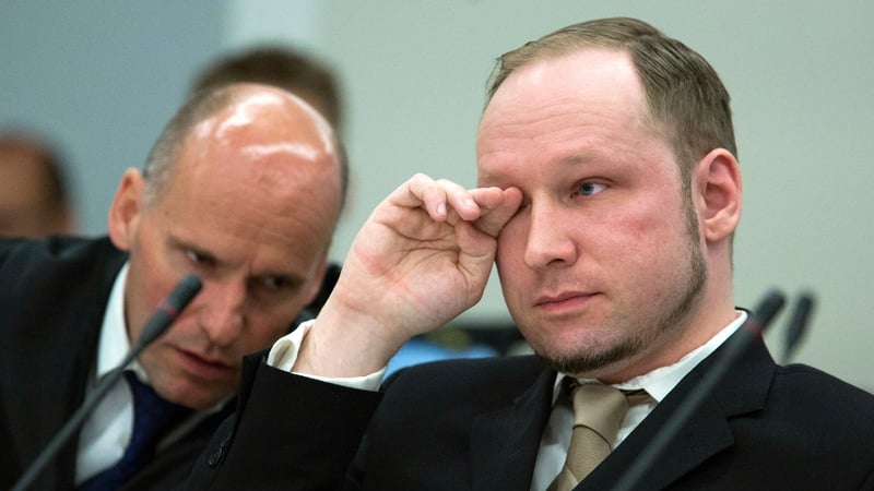 Anders Behring Breivik wipes away a tear as the court views his propaganda film