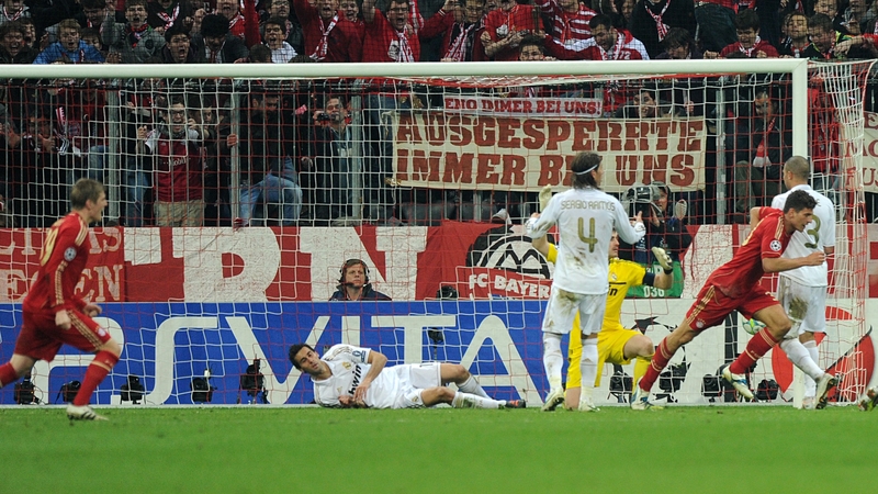 Mario Gomez (r) celebrates his winner for the German side