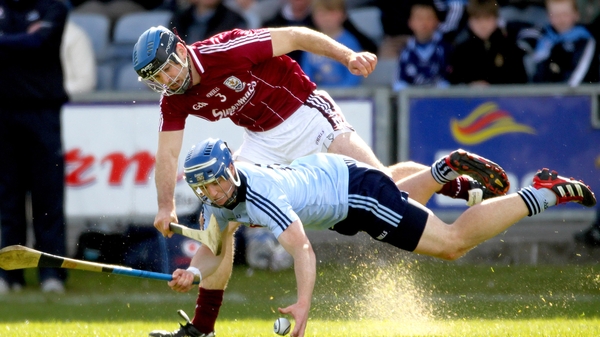 Dublin's David Treacy goes low under pressure from David Collins