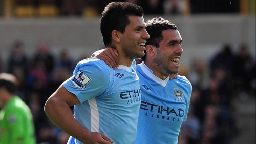 Sergio Aguero and Carlos Tevez celebrate