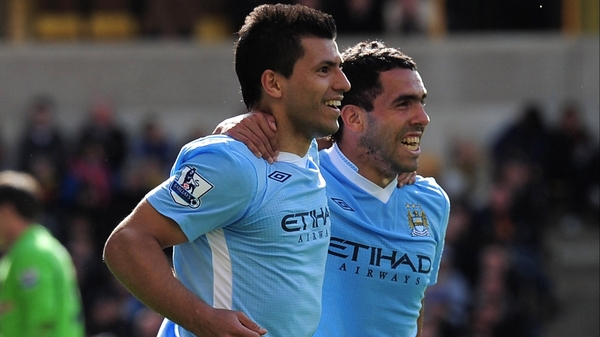 Sergio Aguero and Carlos Tevez celebrate