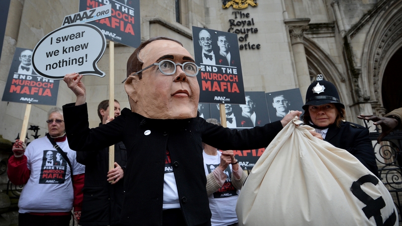 Protesters outside the Leveson Inquiry this morning